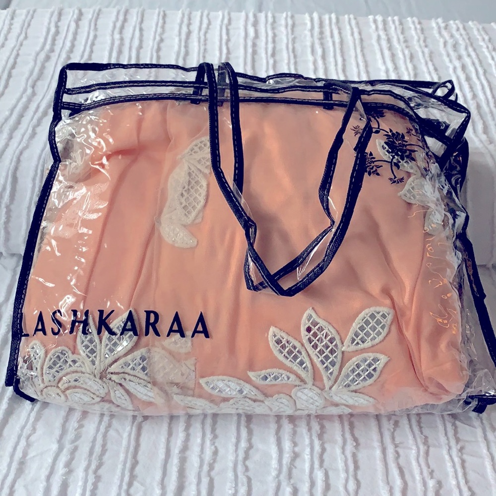 Peach and white floral cut out lehenga